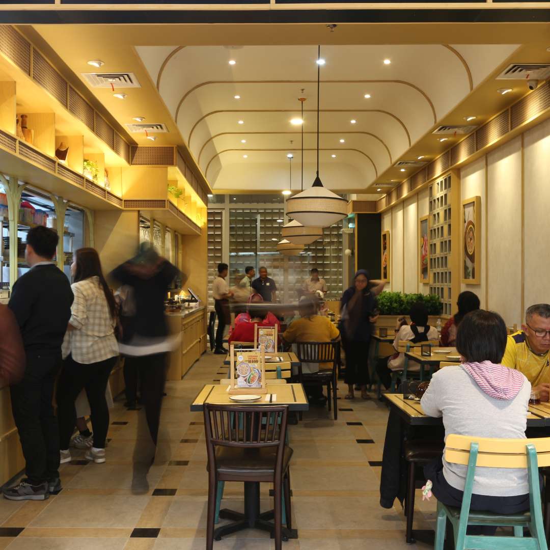 Dining area at Agora Mall offering various lunch options for office workers in Thamrin Nine Complex.